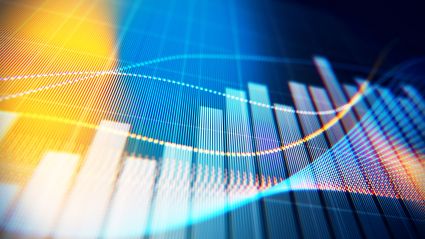 Financial data visualization with colorful bar charts and curved lines on digital display