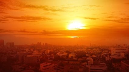 Sun setting over town.